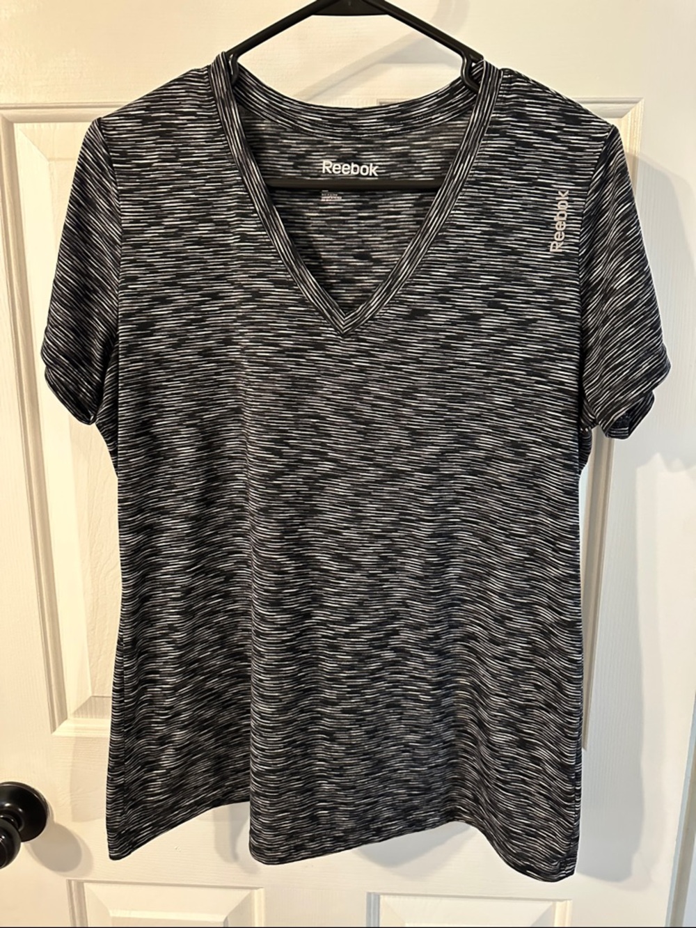 Reebok dri fit material shirt, size large